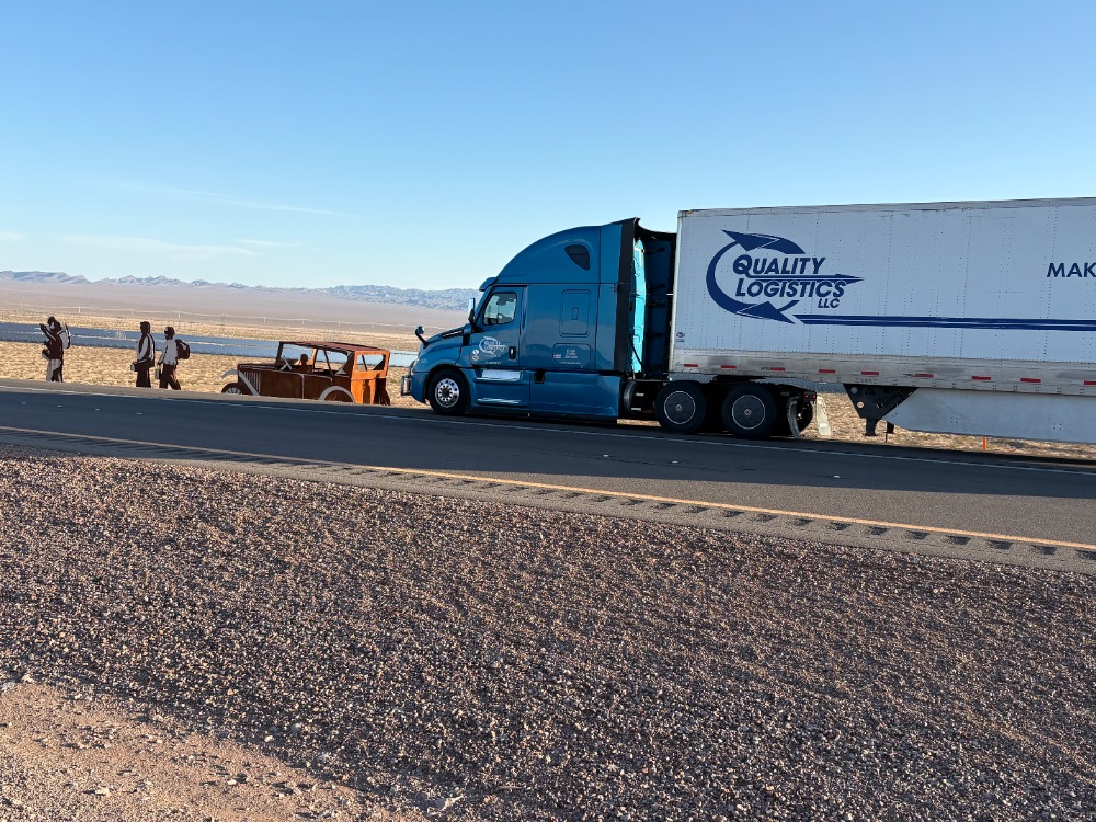 F18 next to Quality Logistics Volvo